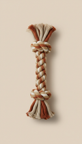 Textured rope chew toy in warm orange